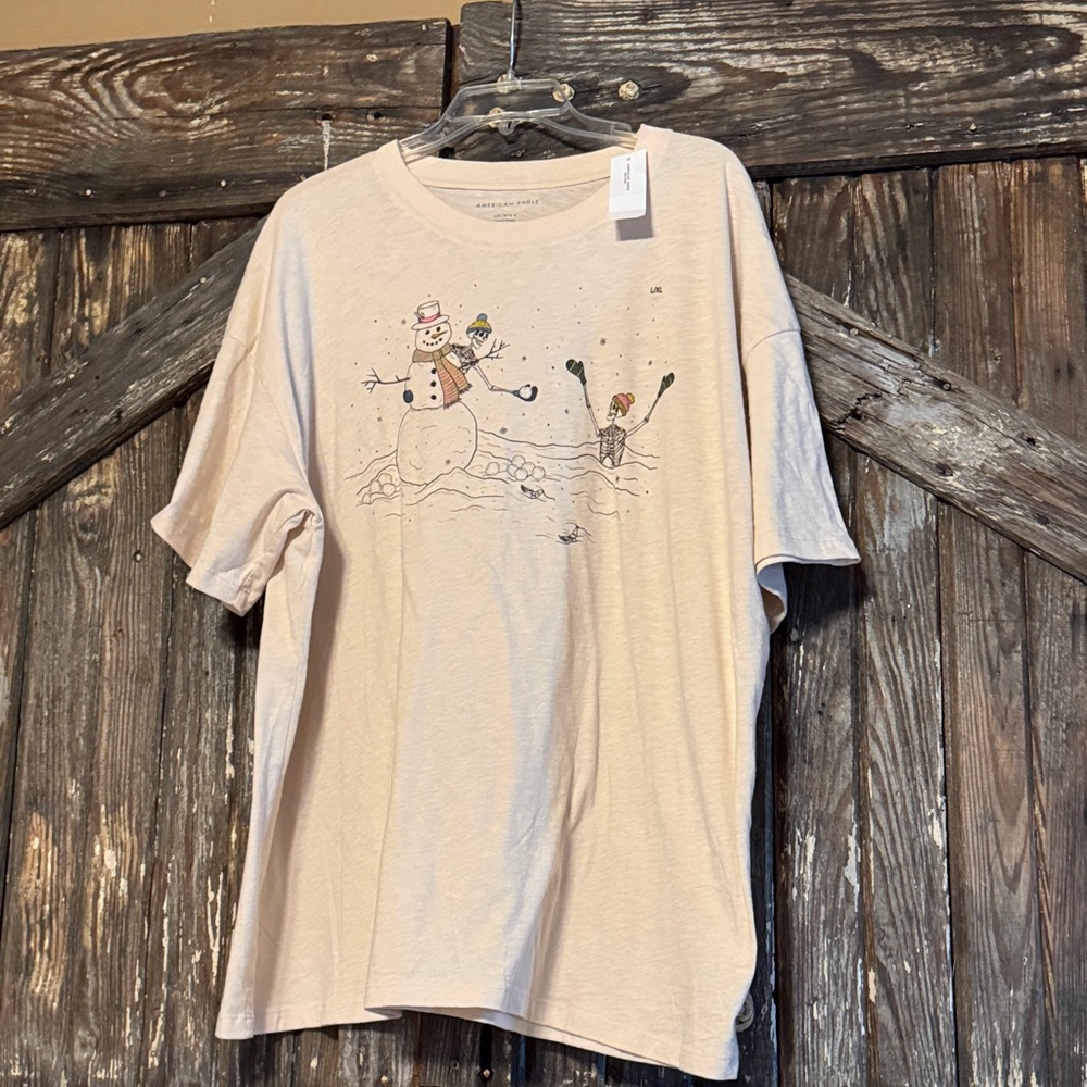 American Eagle Outfitters Cream T-Shirt with Skeletons and Snowman Graphic L/XL